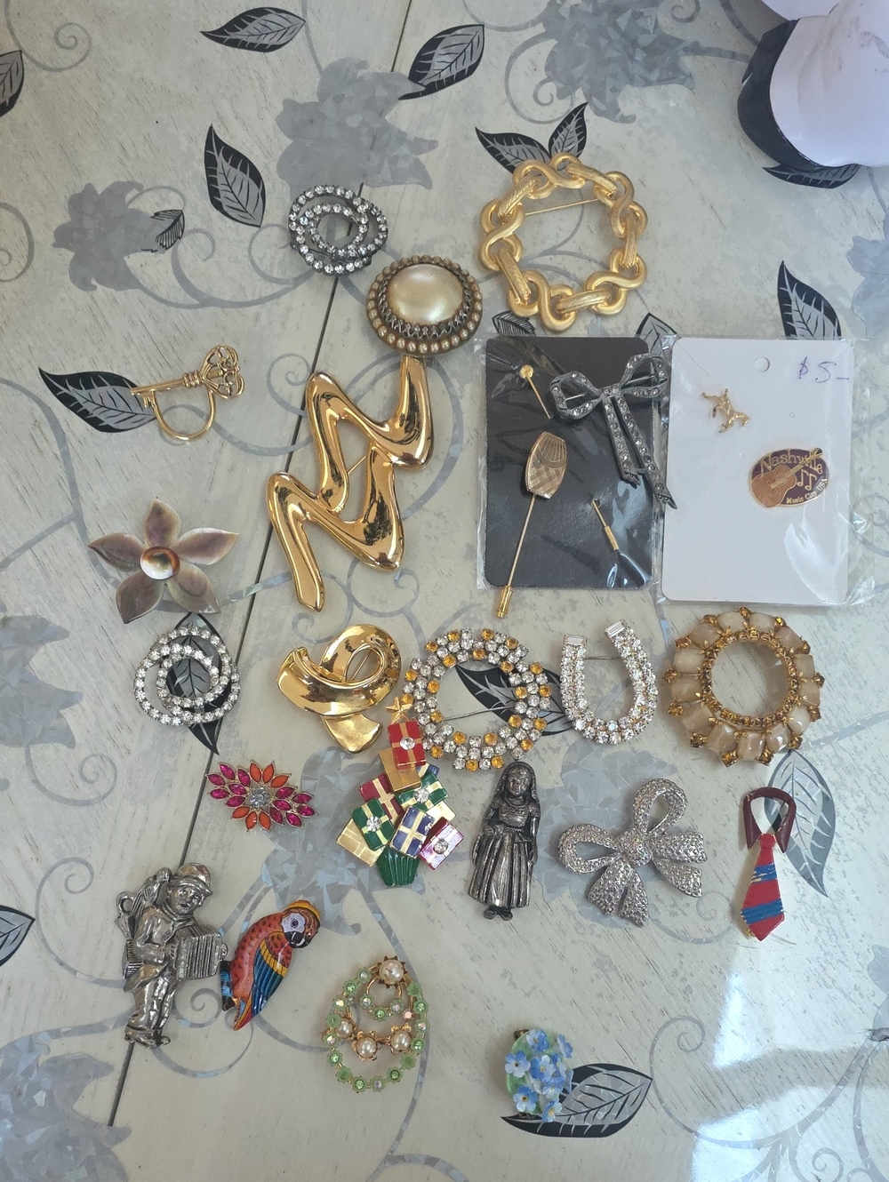 20 brooches -- 4 free